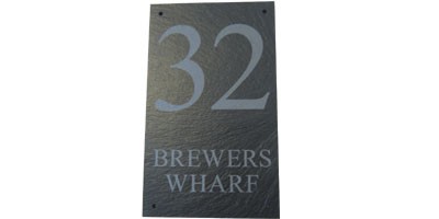 Your house number and street address or house name on a single stylish slate sign